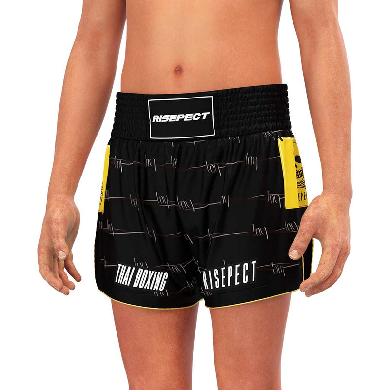 Male Model in Black Tiger Claw & Skull Thailand Muay Thai Sublimation Shorts - front