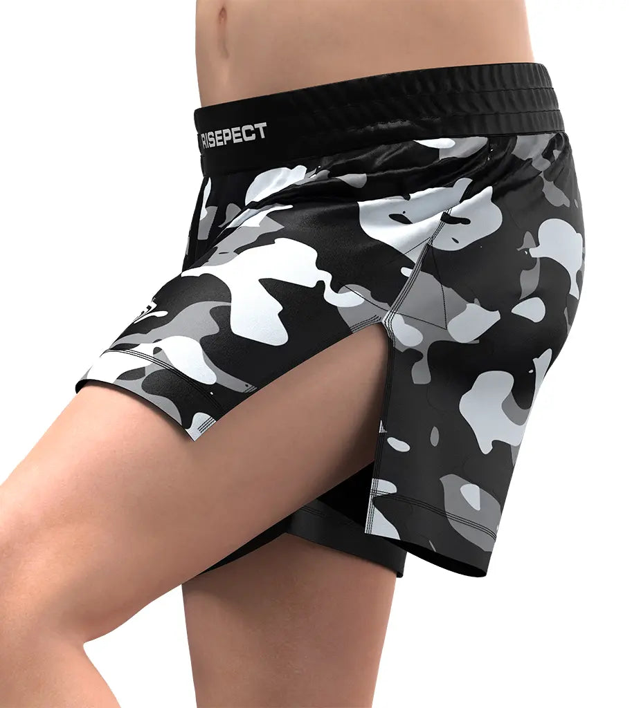 Male Model in Camo High Slit Stone Markings BJJ MMA Hybrid Shorts Left Side View