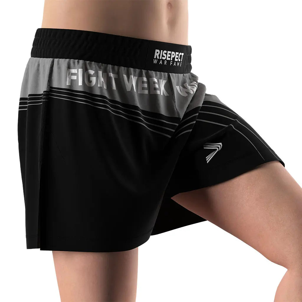 Male Model in Gray-black High Slit Fight Week BJJ MMA Hybrid Shorts Right Front View