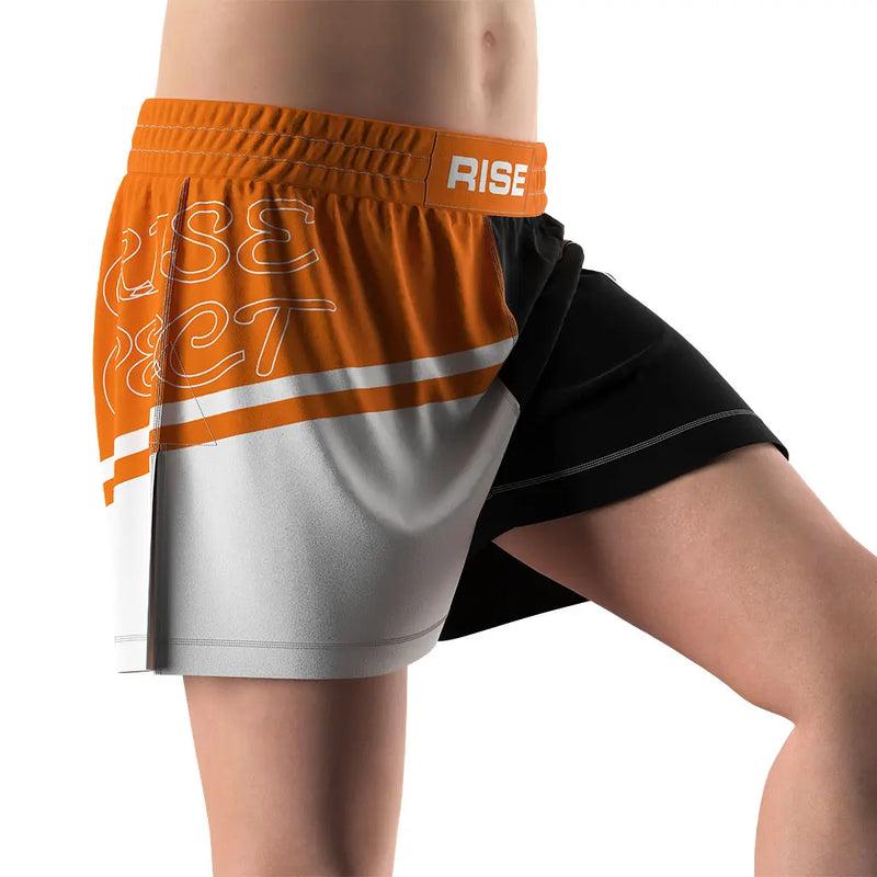 Male Model in Orange High Slit Ignite Line BJJ MMA Hybrid Shorts Right Front View