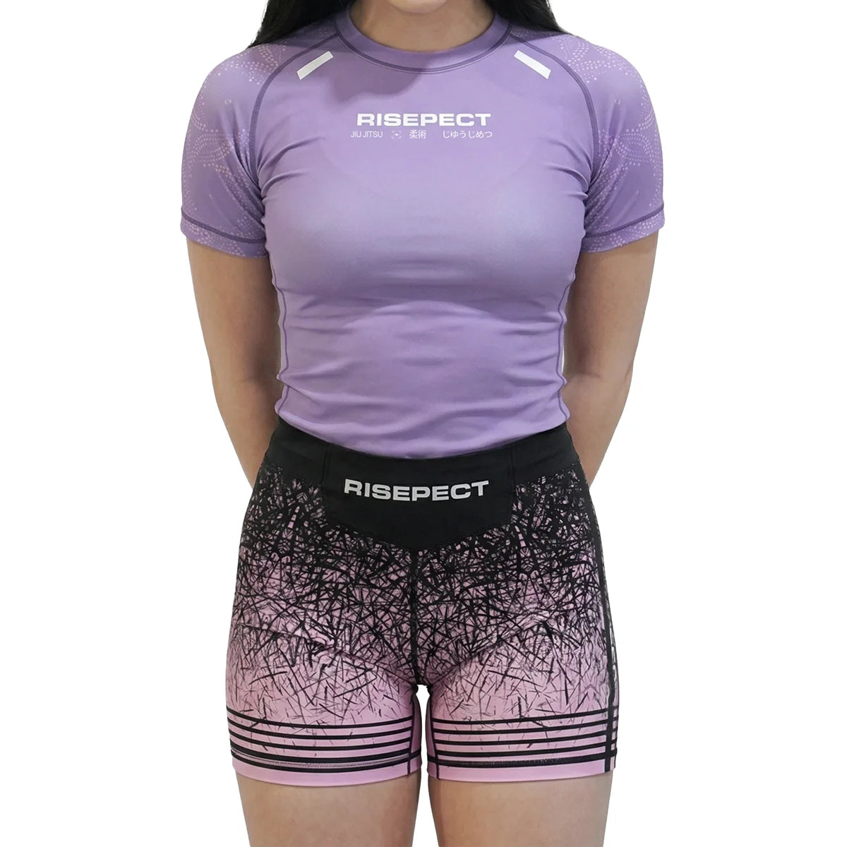Female Model in Lavender Glow Rash Guard 1.0 and Vale Tudo Shorts 1.0